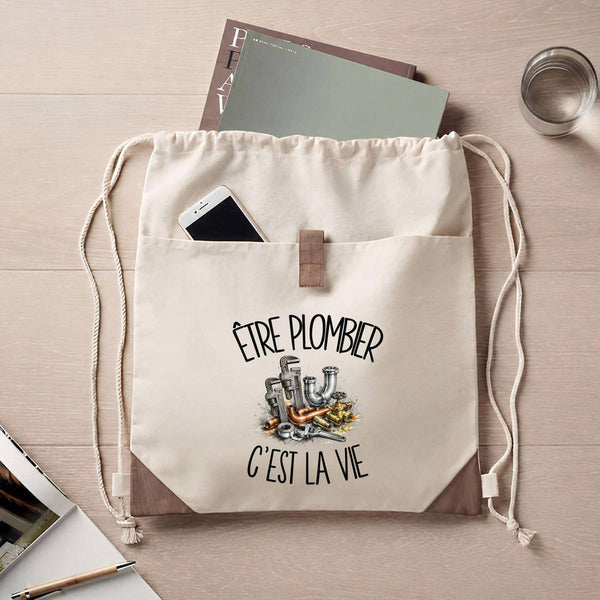 Sac à Dos avec Pochette Avant Beige Être plombier c'est la vie