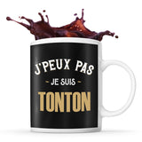 Mug noir J'peux Pas je suis Tonton - Planetee
