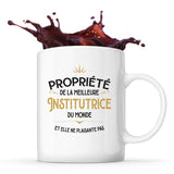 Mug blanc Propriété de la Meilleure Institutrice - Planetee